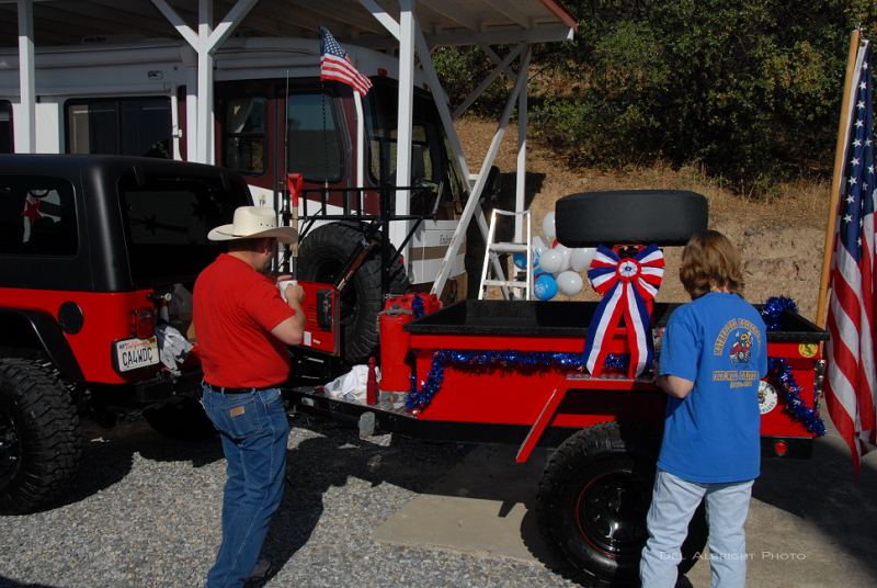 Decorating a jeep trailer for the parade
