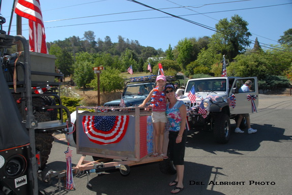 Stacie and Jessica with parade chariot