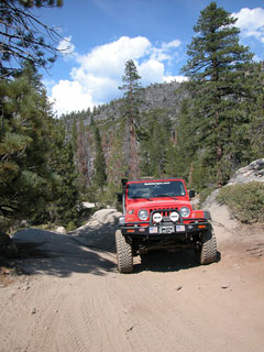 Del's Red Jeep on Trek, 2004